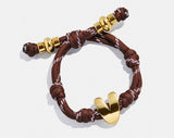 BaubleBar Gold -
Initial waterproof paracord bracelet