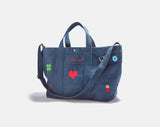 BaubleBar Dark Denim -
Hand select 6 icons to personalize your tote