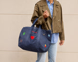 BaubleBar Dark Denim -
Hand select 6 icons to personalize your tote