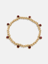 BaubleBar Birthstone Pisa Bracelet - Ruby -
Gold beaded bracelet for stacking