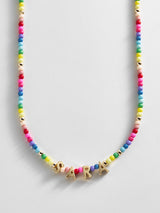 BaubleBar -
Beaded name necklace