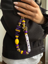 BaubleBar NFL Beaded Phone Charm - Minnesota Vikings - 
    Hands-free wristlet phone strap