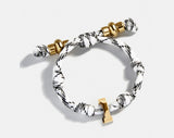 BaubleBar Gold -
Waterproof paracord bracelet
