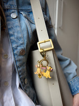 BaubleBar Disney The Lion King Dynamic Duo Bag Charm - Disney The Lion King -
Gold keychain with Disney charms