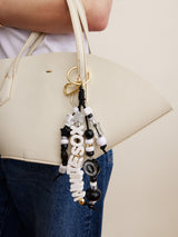 BaubleBar MLB Beaded Bag Charm - Chicago White Sox -
Chicago White Sox bag charm