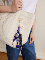 BaubleBar MLB Beaded Bag Charm - Colorado Rockies -
Colorado Rockies bag charm