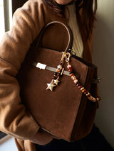 BaubleBar Flying Colors Bag Charm - Earth Tone -
Beaded keychain