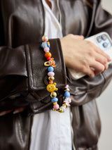 BaubleBar Disney Winnie the Pooh Phone Charm - Disney Winnie the Pooh Phone Charm -
Beaded phone charm