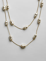 BaubleBar Teagan Long Pearl Necklace - Teagan Long Pearl Necklace -
Gold chain for necklace layering