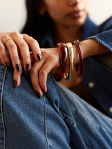BaubleBar Raven Resin Bangle Set - Tiger's Eye -
Set of three bangle bracelets