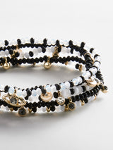 BaubleBar Indya Evil Eye Layered Bracelet Set - Black/White -
Set of five beaded bracelets