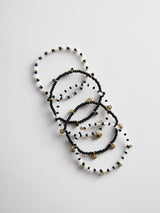 BaubleBar Indya Evil Eye Layered Bracelet Set - Black/White -
Set of five beaded bracelets