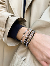 BaubleBar Indya Evil Eye Layered Bracelet Set - Black/White -
Set of five beaded bracelets