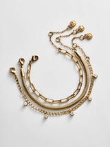 BaubleBar Ainsley Waterproof Bracelet Set - Ainsley Waterproof Bracelet Set -
Set of three gold bracelets