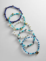 BaubleBar Indya Evil Eye Layered Bracelet Set - Blue Multi -
Set of five beaded bracelets