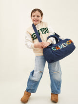 BaubleBar Thready to Go Kids' Custom Duffle - Dark Denim/Multi -
Personalized travel bag