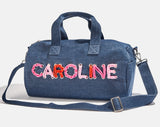 BaubleBar -
Personalized travel bag