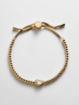 BaubleBar Valerie Bezel Pisa Bracelet - Crystal -
Gold Birthstone Beaded Bracelet