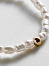 BaubleBar Ginnie Pearl Bracelet - Single Gold -
Beaded stretch bracelet for stacking