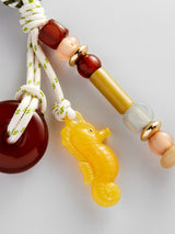 BaubleBar Sea Breeze Bag Charm - Seahorse -
Embellished keychain