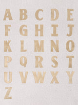 BaubleBar Natural -
Hand select 6 icons to personalize your tote