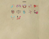 BaubleBar Beige -
Hand select 5 icons to personalize your tote