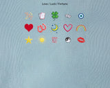 BaubleBar Light Denim -
Hand select 5 icons to personalize your tote