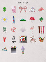 BaubleBar Natural -
Hand select 6 icons to personalize your tote