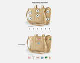 BaubleBar Beige -
Hand select 6 icons to personalize your tote