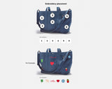BaubleBar Dark Denim -
Hand select 6 icons to personalize your tote