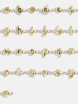 BaubleBar Bubble Initial Tennis Bracelet - Tennis Bracelet -
Adjustable bracelet with glass stones