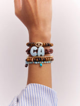 BaubleBar Knotty Enamel Initial Custom Bracelet - Brown/Blue Single Letter -
Ends Friday: Enjoy 20% Off