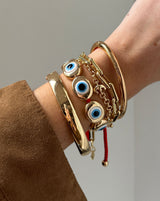 BaubleBar Eye to Eye Bracelet - Gold/Blue -
Enjoy 25% Off: It’s the Big Biannual Event