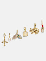 BaubleBar  - 
    Create your own cluster charm necklace