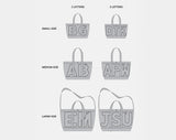 BaubleBar Solid Custom Alpha Tote - Mushroom Taupe -
Personalized canvas tote bag with custom embroidered initials