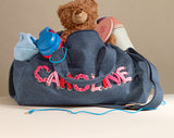 BaubleBar -
Personalized travel bag
