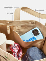 BaubleBar Beige -
Hand select 6 icons to personalize your tote