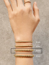 BaubleBar Heart Of Gold Pisa Bracelet - Gold - 
    Heart beaded stretch bracelet
  
