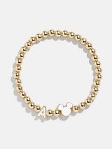 BaubleBar A - 
    Disney gold beaded stretch bracelet
  

