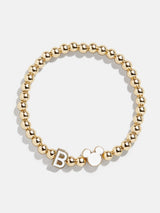 BaubleBar B - 
    Disney gold beaded stretch bracelet
  
