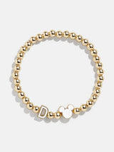 BaubleBar D - 
    Disney gold beaded stretch bracelet
  
