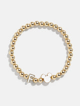 BaubleBar F - 
    Disney gold beaded stretch bracelet
  
