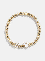 BaubleBar N - 
    Disney gold beaded stretch bracelet
  
