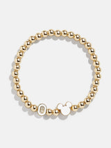 BaubleBar O - 
    Disney gold beaded stretch bracelet
  
