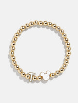 BaubleBar T - 
    Disney gold beaded stretch bracelet
  
