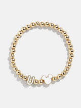 BaubleBar U - 
    Disney gold beaded stretch bracelet
  
