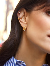 BaubleBar Greer Earrings - Gold -
Gold huggie hoop earrings