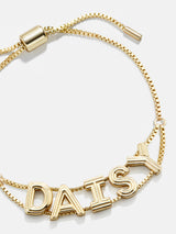BaubleBar Retro Slider Custom Bracelet - Etched Gold - 
    25% Off Custom Gifts: The Annual Custom Event