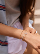 BaubleBar 18K Gold Evil Eye Bracelet - Pavé Evil Eye - 
    18K gold plated sterling silver, Cubic Zirconia stones
  
