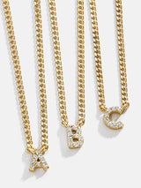 BaubleBar 18K Gold Mini Initial Necklace - Gold/Pavé - 
    18K Gold Plated Sterling Silver, Cubic Zirconia stones
  
